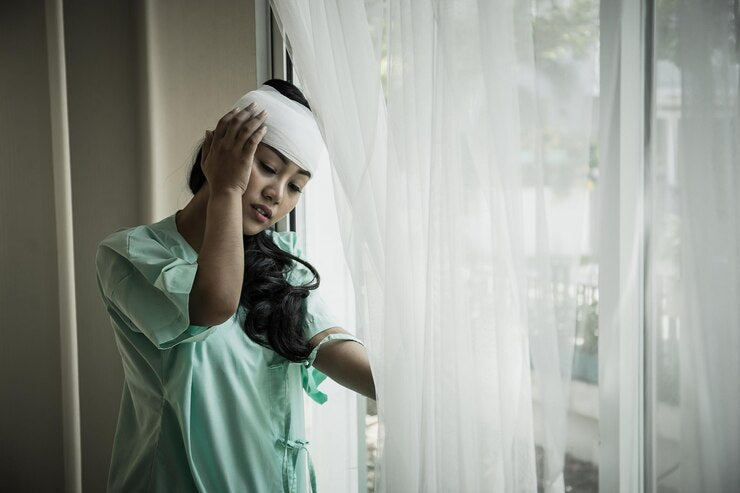 Doctor adjusting gloves after surgery.