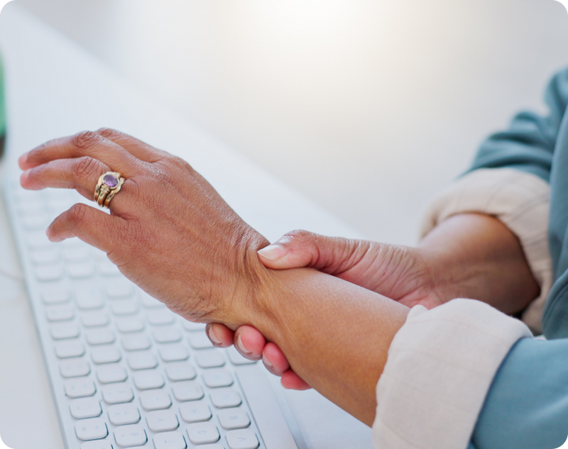 Essential Tremor DBS care, where a doctor holds an elderly patient's hands during a hospital visit.