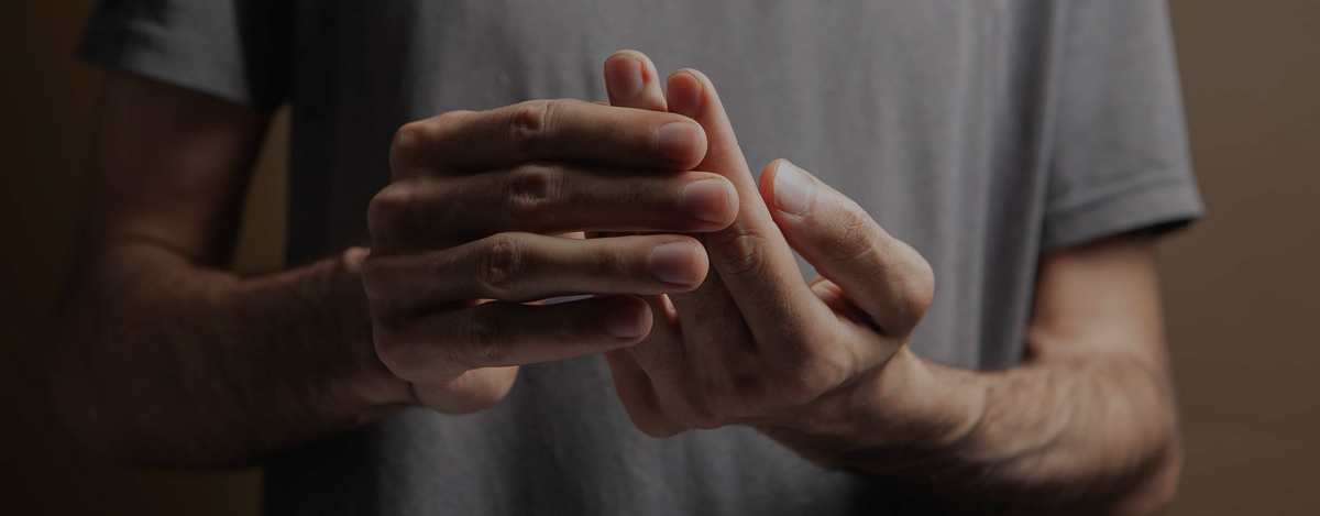 Managing Embarrassment from Tremors in Social Situations